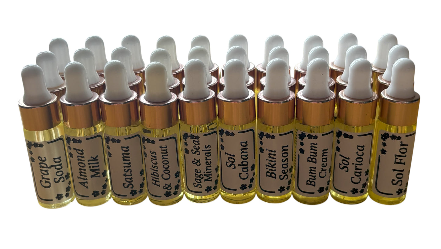 Multiple small bottles with droppers labeled with various names on a white background