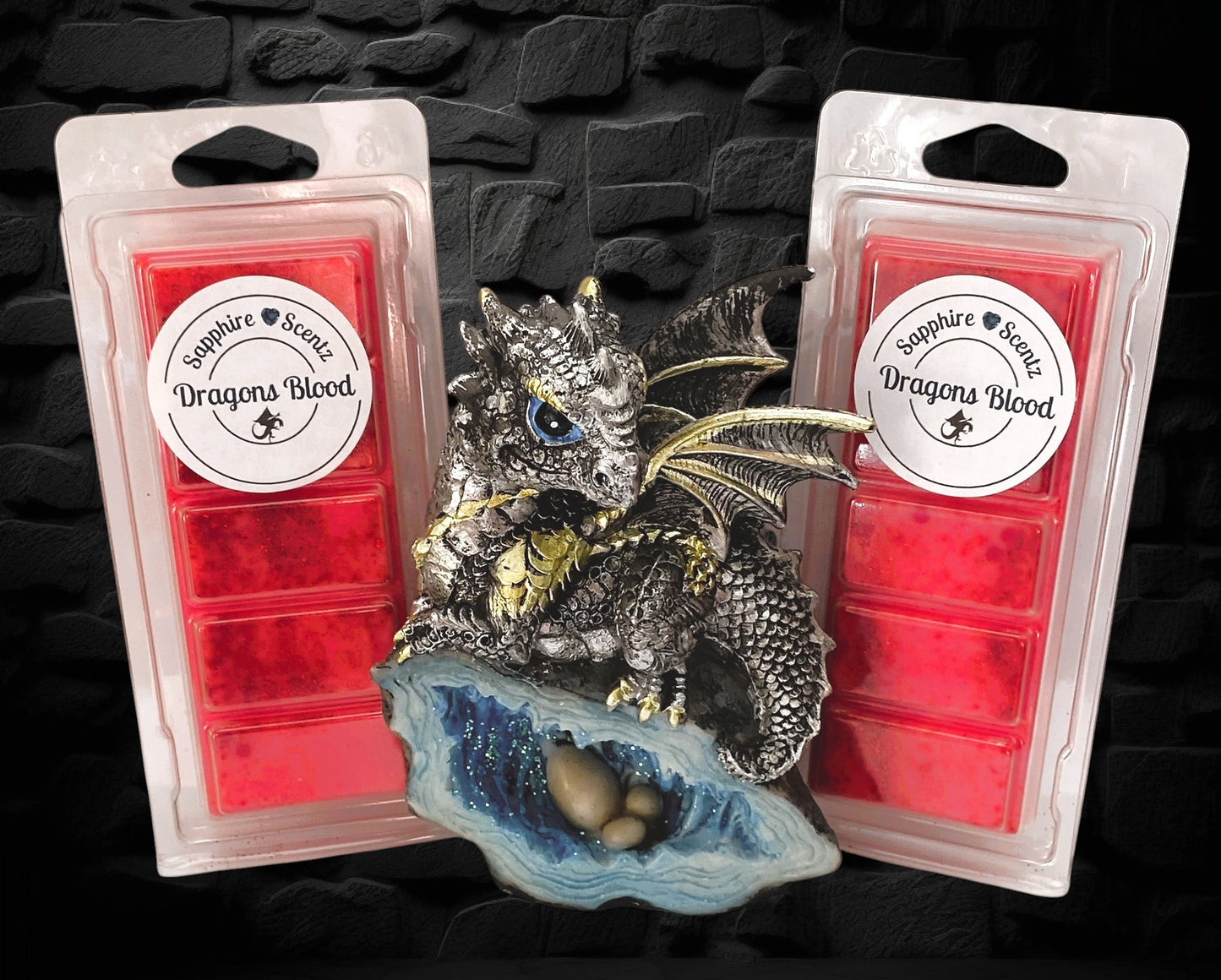 A wax snap bar with a decorative dragon figure on top, labeled 'Dragons Blood'.