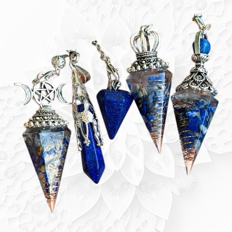 Set of four crystal pendulums with blue and silver designs on a white background