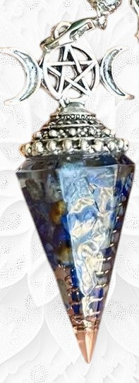 Crystal pendulum with star and moon design on a white background