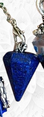 Blue pendant with chain on a white background