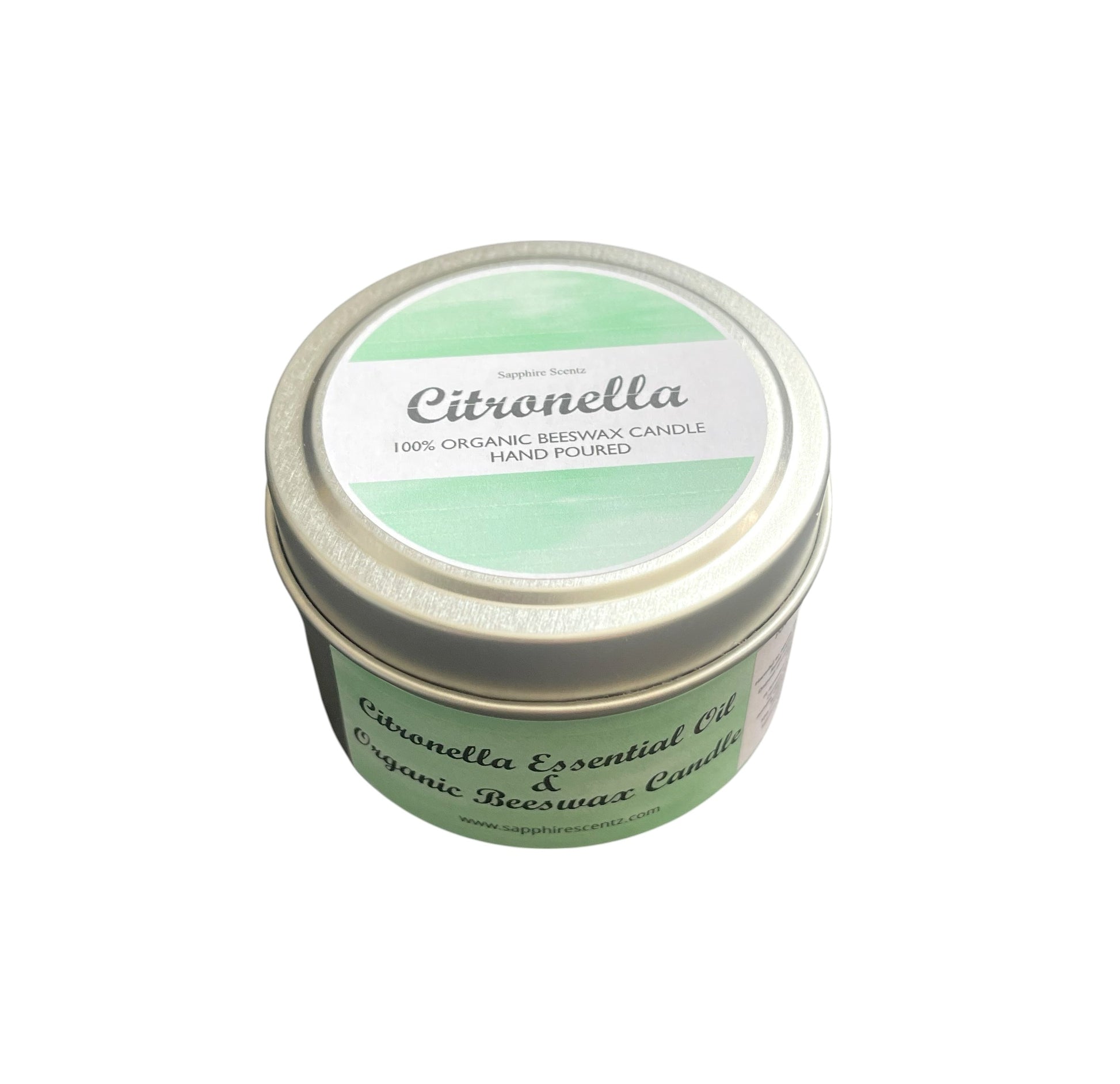 Green candle in a tin with 'Citronella' label on a white background