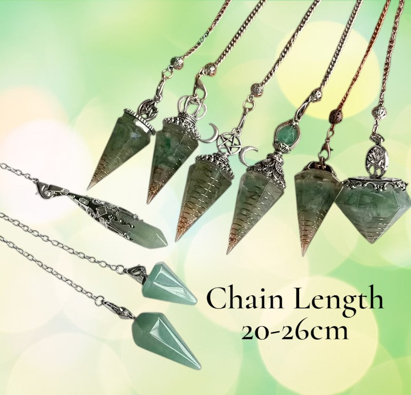 Necklaces with green pendant stones on a soft, multicolored background