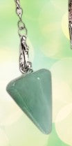Green triangular pendant on a chain against a light green background