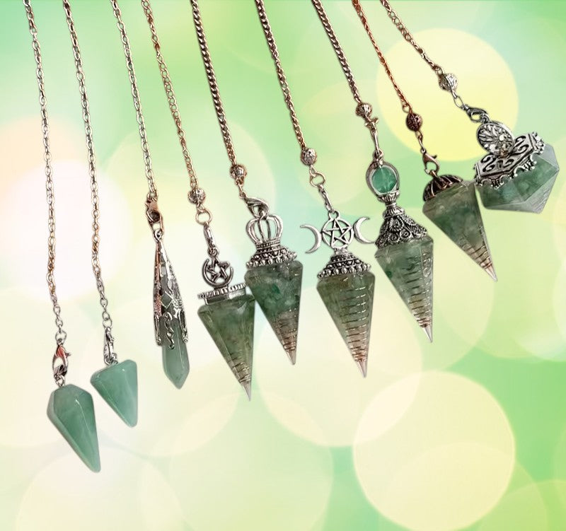 Set of green stone necklaces with various pendants on a soft, blurred background