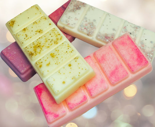 A collection of snap bars with various floral fragrances, each section snap bar is in a different color representing different scents.