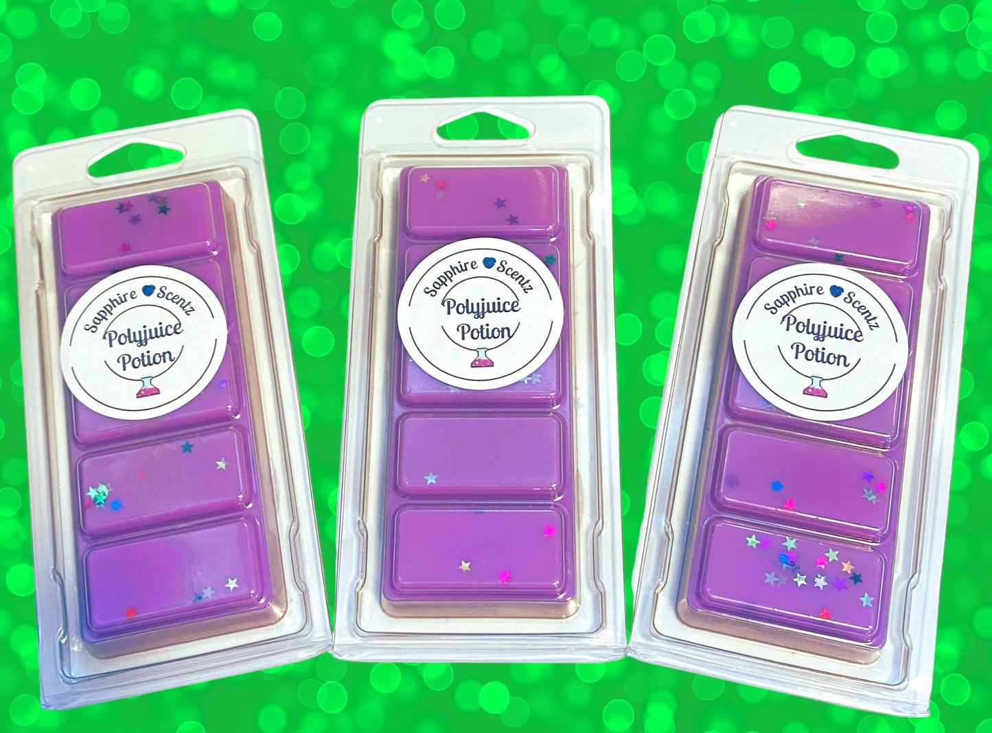 Three snap bars of Harry Potter Polyjuice Potion wax in purple color with varying amounts of black, blue, and pink speckles, packaged in clear plastic with labels on top.
