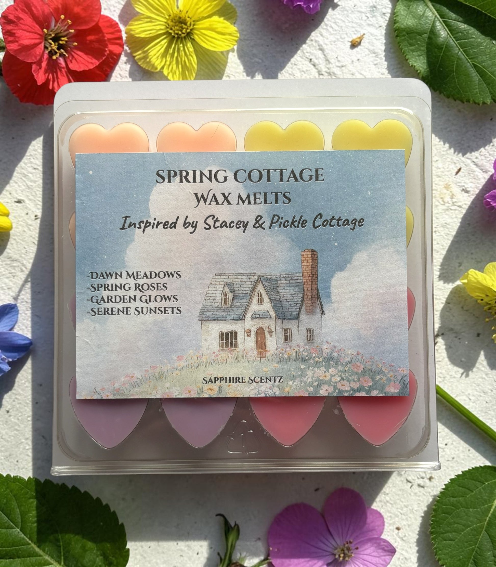 Spring Cottage Wax Melts packaging with a house illustration on a floral background